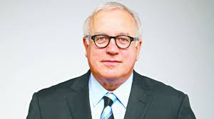 Alan Kohler among famous faces of Kew home's storeyed history