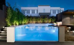 20 Stunning Glass Swimming Pool Designs Modern Pools Swimming Pool Designs Swimming Pools