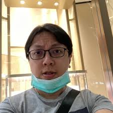 振荣郭was traveling to Siem Reap with Dennis Tan from Changi Airport T2.