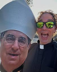 Bishop Duca (fathead version) & I will be riding in the front of the St.  Patty's parade today. I look forward to seeing all of you along the route.  Best signs get