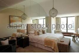 However, if you do not have any other light sources in the house and you want to. Master Bedroom With Mirrored Wall And Curved Ceiling Lights Off In Stock Photo Alamy