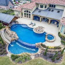 Good Afternoon Tag Someone Who Would Love This Pool It Features A Slide Swim Up Bar Spa And Sunk Luxury Swimming Pools Dream Backyard Pool Backyard Pool