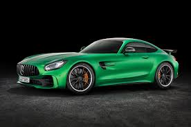 With 577 Hp And A Searing Green Paint Job The 2018 Mercedes Amg Gt R Adds A Ton Of Performance To The Gt Lineup Mercedes Amg Gt R Mercedes Benz Amg Gtr