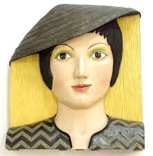 Caroline C Matthaei (20thC). Thea, carved and painted limewood, signed and  titled verso, 41cm high. Provenance: