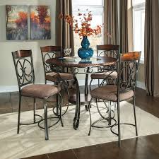 A counter placed at a lower height brings down the eating area to a more comfortable level and can be used in combination with regular dining chairs. Signature Design By Ashley Glambrey Counter Height Dining Table Chairs Sold Separately Walmart Com Walmart Com