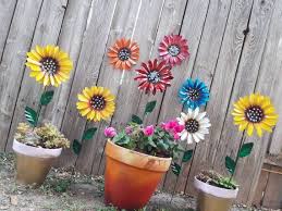 Common plant pot materials include metal, wood, plastic, concrete and another stoneware such as ceramics. Metal Flowers Fence Flowers Fence Decoration Metal Flowers For Fence Or Tree Small Size Flower Fence Metal Flowers Colorful Flowers