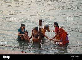 Women bathing in holy river hi