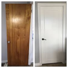 Updated Old Wood Doors To A Modern Look With Wood Trim Primer White Pearl Paint And New Handles Old Wood Doors Updating House Door Makeover