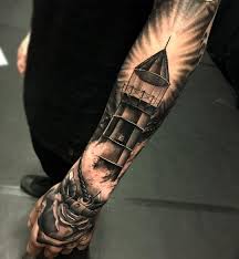 Black And White Forearm Half Sleeve Tattoos For Men Image For Black And White Half Sleeve Tattoos For Men Tattoosformenforearm Lighthouse Tattoo Half Sleeve Tattoo Tattoos For Guys