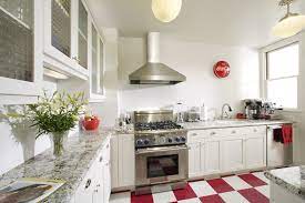 A kitchen needs an easy to clean floor surface that can stand up to the wear and tear of a restaurant. Beautiful White Kitchen With Red White Floors Plus Red Accessories Traditional Kitchen Sacramento By D J Kitchens And Baths Inc Houzz