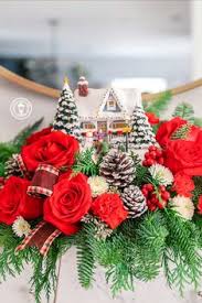 We send our letterbox flowers via royal mail's tracked service for free next day flower delivery, straight through the door with the other post. 140 Christmas Flowers Ideas Christmas Flowers Christmas Centerpieces Christmas Flower Arrangements