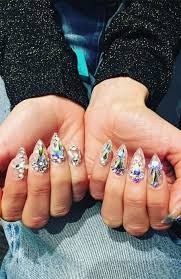 | oil slick metallic gradient foil nail art. 20 Stylish Nail Trends To Try In 2021 The Trend Spotter