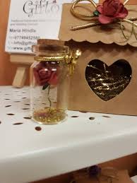 Incorporated in 1907, nicholson is home to a number of small. Rose In A Bottle With House Favour Box