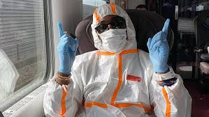 Tinie Tempah Takes Inspiration From Naomi Campbell As He Wears A Hazmat Suit Gloves And A Mask Daily Mail Online