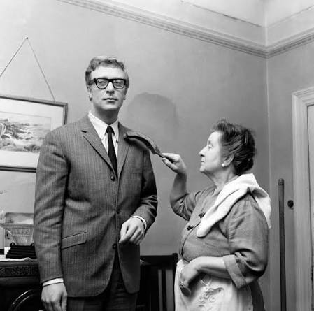 MICHAEL CAINE at home with his mother Ellen in 1964.