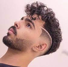 Curly Undercut 30 Modern Curly Haircuts For Men Men S Hairstyle Tips Men Haircut Curly Hair Modern Curly Hair Undercut Curly Hair