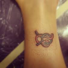 This Is The Tattoo That We Both Got His Is On His Left Arm Mine Is Just Above My Right Ankle Leo Taurus Signs Intertwined Tattoos Leo And Scorpio Body Art