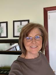 Enjoyed being naturally grey for the past three years, I have a great  hairdresser and would like your opinion