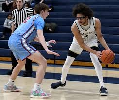 Basketball: Isaiah Manley gives his all for Bishop Noll