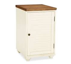 I found two ugly orangey colored oak filing cabinets at my local goodwill. Whitney Filing Cabinet Pottery Barn