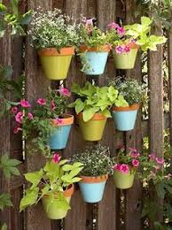 You can plant anything in a planter as long as there's plenty of water, sunshine, and a upcycle an old, rusty ladder by adding a fresh coat of paint and a medley of planters, flower pots. 140 Garden On A Wall Living Walls Ideas In 2021 Flower Pot Hanger Pot Hanger Plants