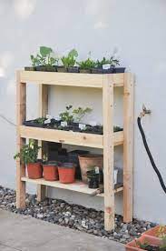 Easy outdoor plant stand tutorial. Diy Outdoor Plant Shelf Hydrangea Treehouse