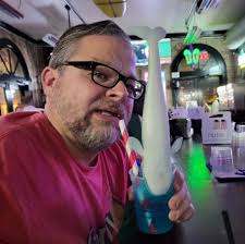 Angus Young with Ozzy Osbourne, 1977