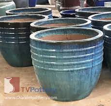 As the name implies, glazed pots are an earthenware pot with a coating of coloured glass on the outside. Large Outdoor Ceramic Pots