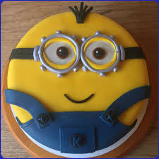 Then use either a piping gel transfer or a toothpick to sketch out a couple minions on the top. It S Kevin Minion Cake Minion Birthday Cake Minion Cake Birthday Cake Kids