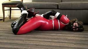 Red Latex Catsuit Girl Muzzled and Tied Up | xHamster