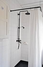 Steal This Look Black And White Shower In Finland Remodelista Black Shower Curtains White Shower Shower Fixtures