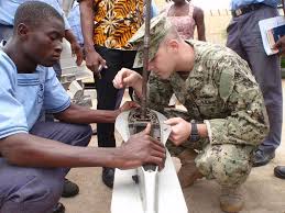Electrician's Mate 1st Class Allen Hodges, right, from