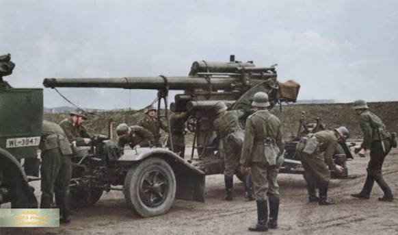 German flak crew with dog beside 8.8 cm flak 36 gun