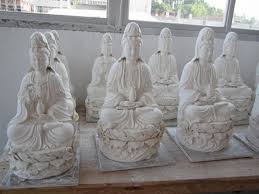 She is the female form of the bodhisattva and sits with prayer beads and an offering bowl. Porcelain Guan Yin Statues From China