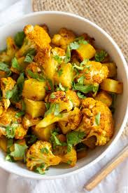 Baked Aloo Gobi Vegan Recipe Indian Spiced Potato Cauliflower Vegan Richa Recipe Aloo Gobi Vegan Recipes Gobi Recipes