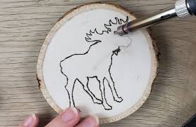 A drill for making a hole to hang the ornament. Rustic Wood Burned Coasters Tutorial Free Patterns Marching North