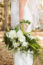 Anastasia used a complimentary assortment of picasso calla lilies, freesia, hydrangeas and fern fronds to create this fabulous beauty. Ivory Flower Bouquet With Fern