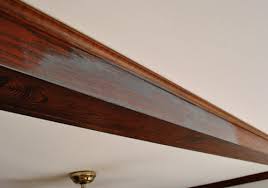 Any advice on whether to paint the dark wood ceiling beams and what colour? Gray Washing The Ceiling Beams In Our Living Room Young House Love