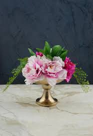 Shimmering gold metal finish will add vibrancy to your display. Copper Metal Flower Vase Compote 8x7 Quick Candles