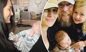 Nikki bella marks her 39th week of pregnancy with intimate snap of fiance artem chigvintsev holding her baby bump. Nikki And Brie Bella Share New Photos Of Baby Boys Born 24 Hours Apart As Twins Enjoy Lazy Sunday Daily Mail Online