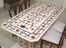 This large art deco table has been executed with a lovely graphical wooden inlay on top. Marble Inlaid Stone Inlay Crafts Marble Inlay Crafts Stone Handicrafts More Marble Inlay Dining Table Tops Antique Collection Ligozzi