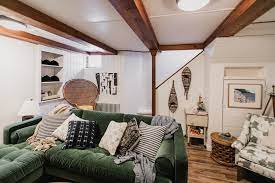 And the dark gray door is a fresh contrast against the white trim and new wall color. Wood Panel Basement Diy Makeover Apartment Therapy