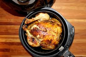 Air Fryer Whole Roasted Chicken Funny Is Family Roast chicken and potatoes, turning potatoes once or twice to coat in juices and oil that accumulate in pan, until potatoes are very tender when pressed with the back of a spoon, and chicken skin is deep. air fryer whole roasted chicken funny