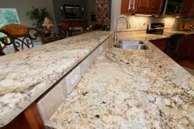 Gold And Silver Granite With Hints Of Grey Paired With Dark Brown Cherry Cabinetry Granite Countertops Granite Custom Granite