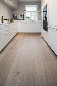 Engineered wood planks have a top veneer of real wood backed by a layer of plywood that make the planks stable and the flooring less susceptible to humidity and temperature — a good kitchen flooring idea. Pin On Hardwood Floor Colors