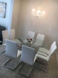 This glass dining table is ideal for any dining room set, giving a clean and polished look to any room. Glass Dining Room Tables 121 Glass Dining Room Tables 121 Design Ideas And Photos Square Glass Dining Room Table Chrome Dining Table Glass Dining Room Table