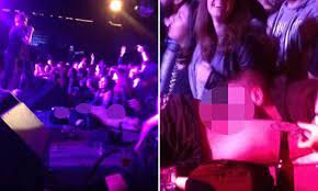Punk rock show interrupted by fans performing oral sex on stage | Daily  Mail Online