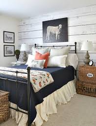 Blue accent wall, cozy farmhouse master bedroom with natural wood accents. Pin By Susan On Provincial Rural Farmhouse Life Farmhouse Style Master Bedroom Rustic Master Bedroom Country Style Bedroom