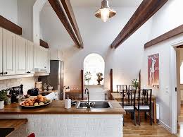 What kind of kitchen has exposed beam floor? Beautiful Small Attic Apartment In Sweden With Scandinavian Influences Homesthetics Inspiring Ideas For Your Home