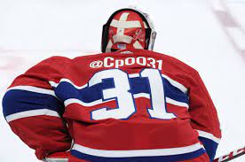 It's carey's favourites contry singer on one side its garth brooks and on the other side its george strait or clint black. I Love Goalies Carey Price 2018 19 Mask